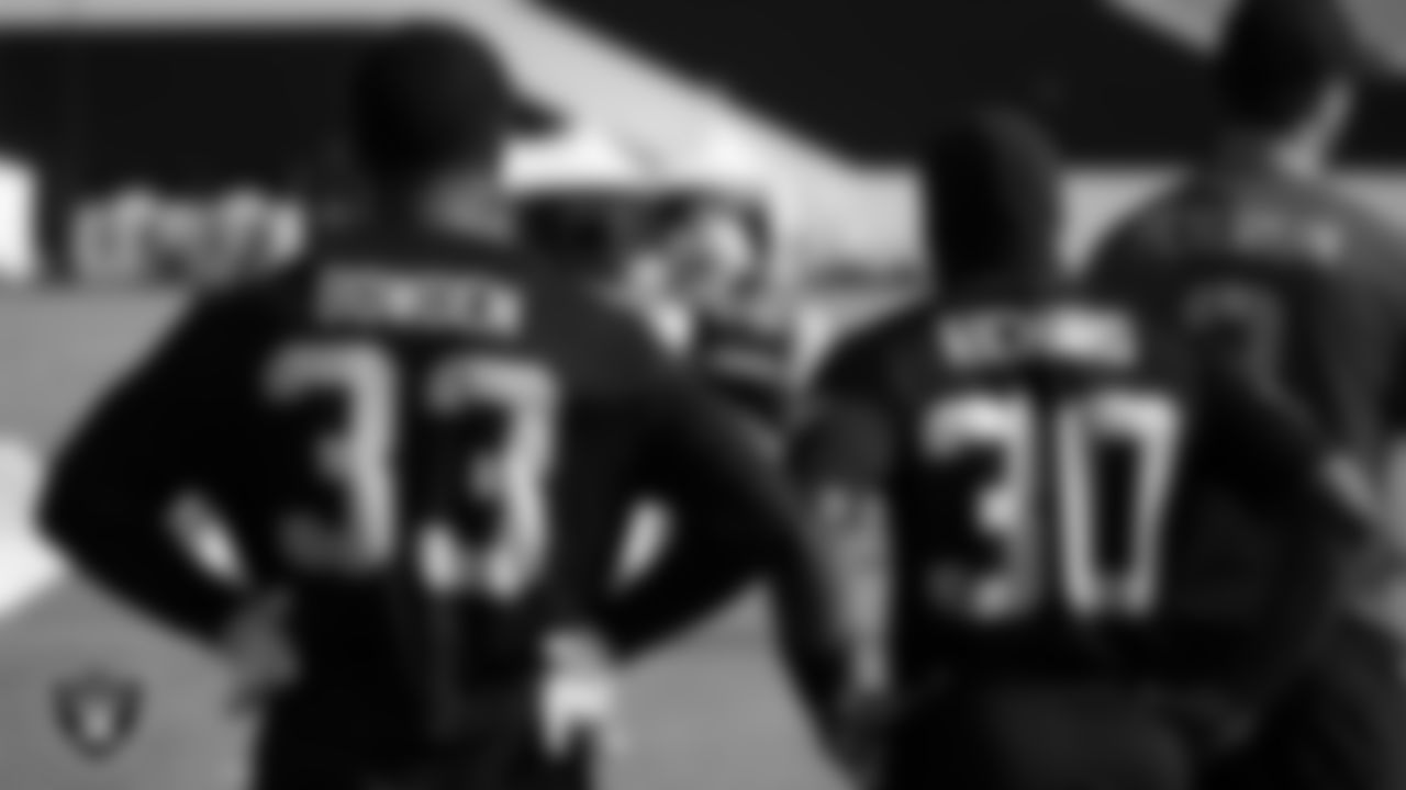 Las Vegas Raiders running back Lynn Bowden Jr. (33) and running back Jalen Richard (30) on the field for a walk through at 2020 Training Camp.
