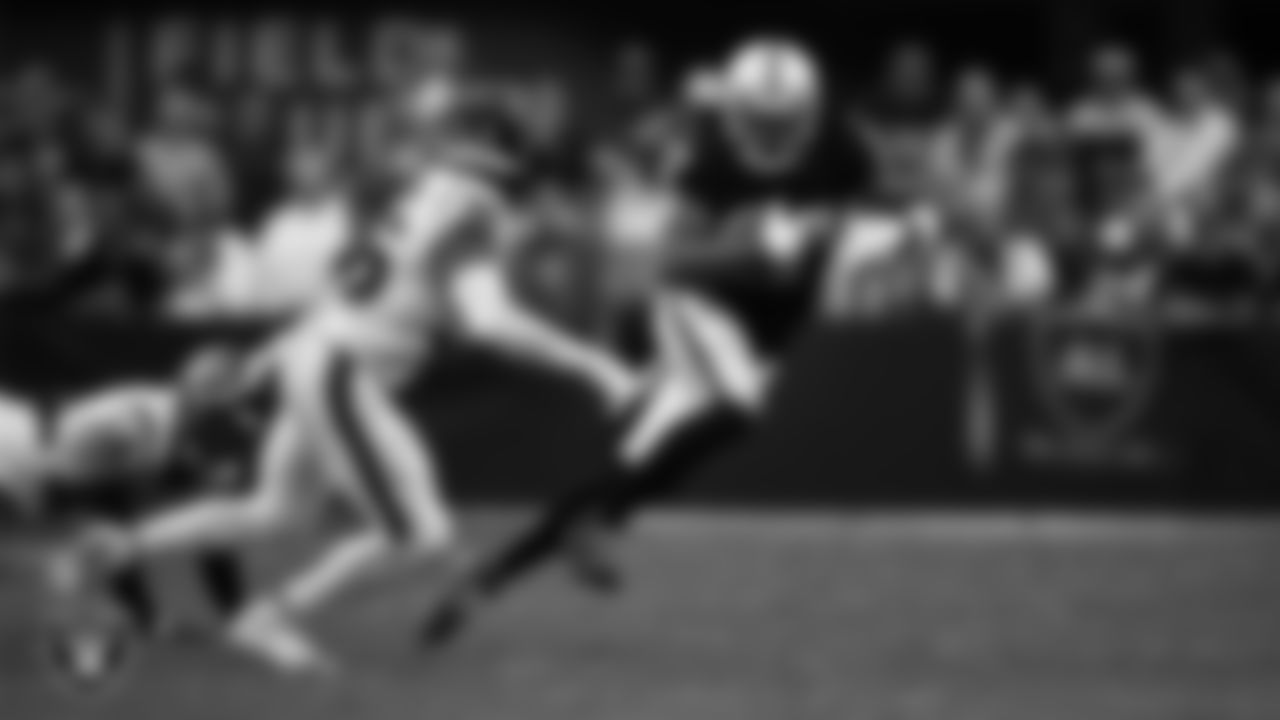 Las Vegas Raiders wide receiver Davante Adams (17) runs after making a catch during the regular season home game against the Houston Texans at Allegiant Stadium.