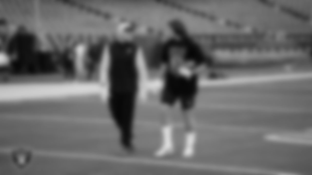 Las Vegas Raiders linebacker Robert Spillane (41) and tight end Jesper Horsted (80) warming up before the regular season away game against the Chicago Bears at Soldier Field.