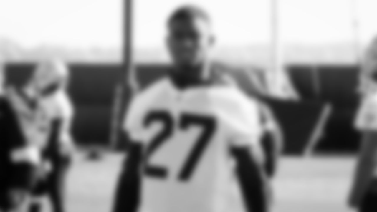 Raiders cornerback Trayvon Mullen (27) stands on the field during practice.