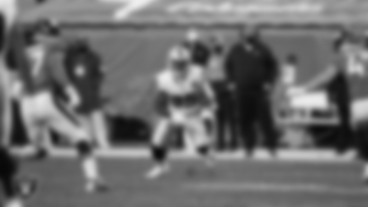 Las Vegas Raiders running back Theo Riddick (35) runs after making a catch during the regular season away game against the Denver Broncos.