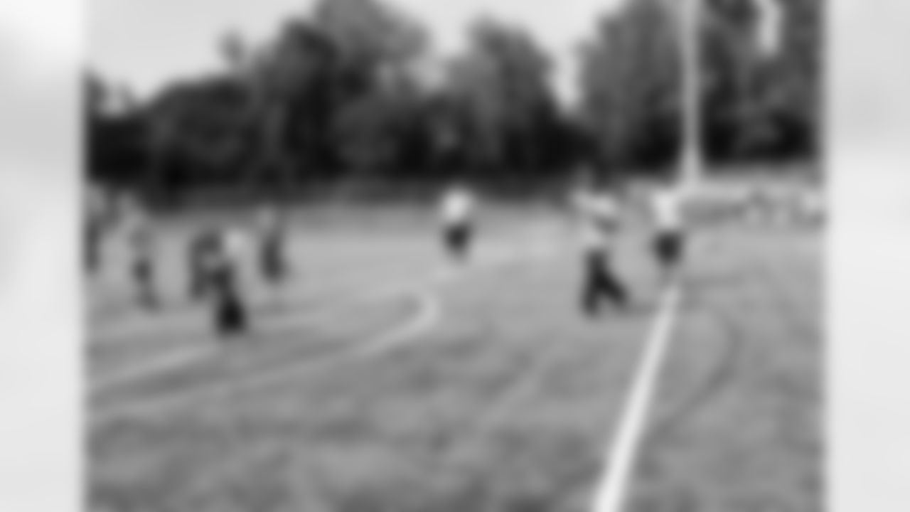DB Phillip Adams plays quarterback for one of the flag football teams.