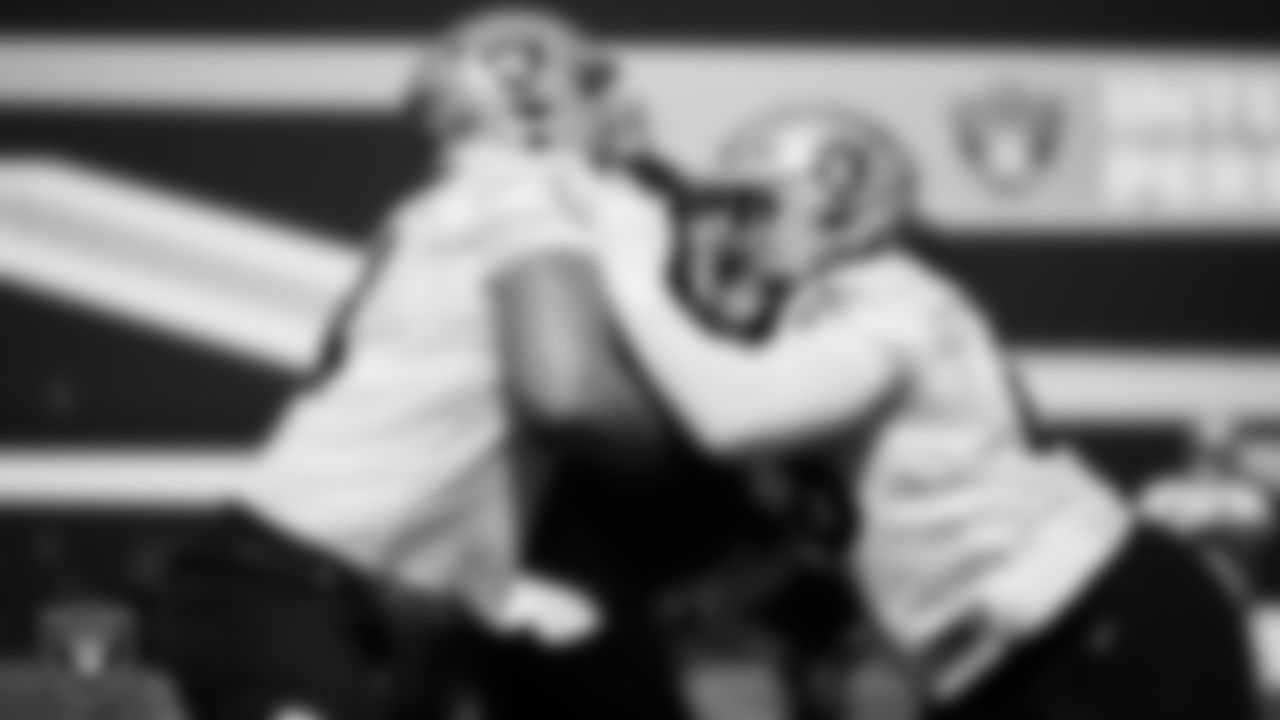 Las Vegas Raiders tackle Kolton Miller (74) and guard Dylan Parham (66) during practice at Intermountain Health Performance Center.