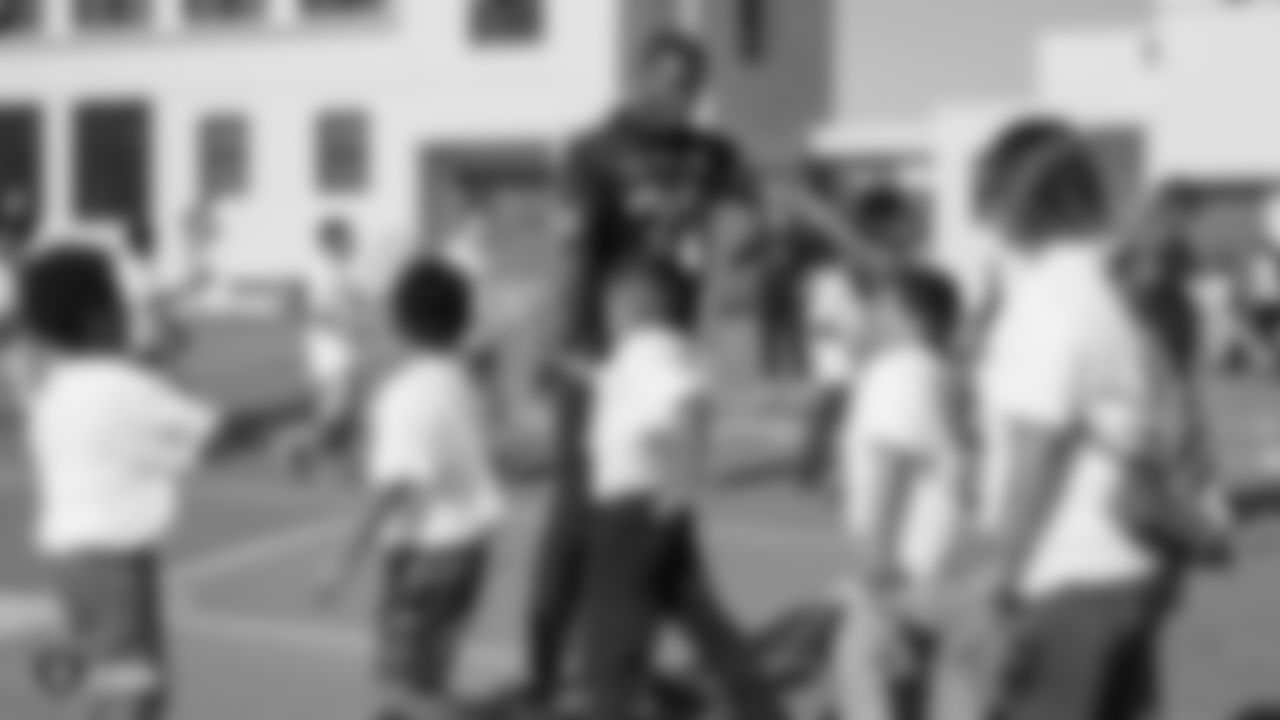 The Oakland Raiders, represented by players Alec Ingold, Isaiah Johnson, Trent Sieg, Darren Waller, and Kyle Wilber, along with the Raiderettes, collaborate with Playworks to promote Play 60's message to students of being active for sixty minutes everyday.