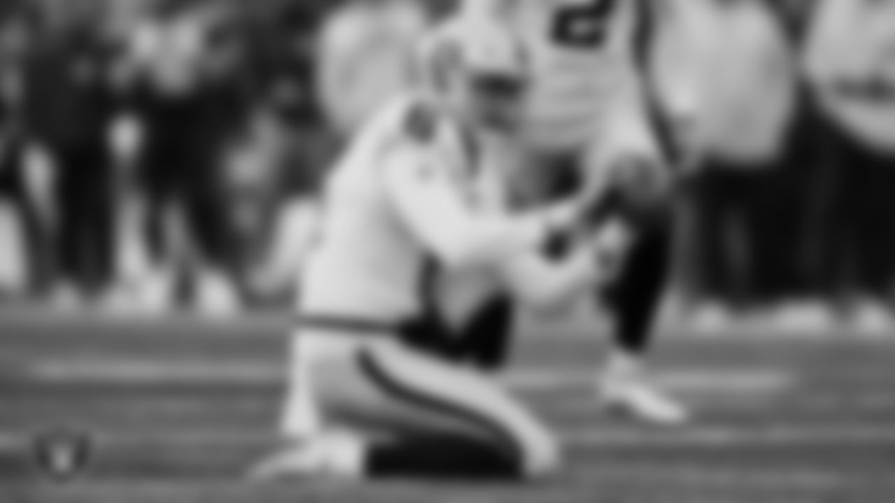 Las Vegas Raiders punter AJ Cole (6) receives the snap during the regular season away game against the Seattle Seahawks at Lumen Field.
