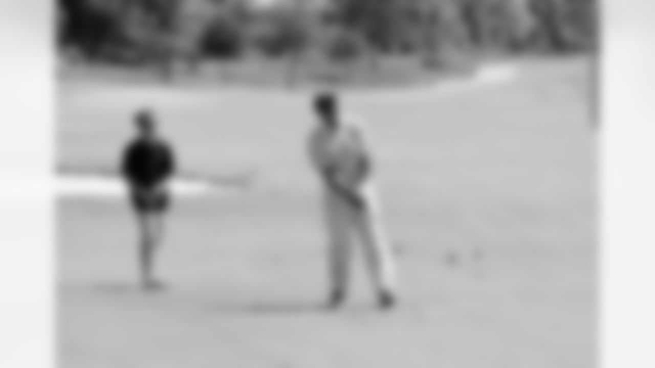 Hall of Famer Bobby Bell watches his shot.