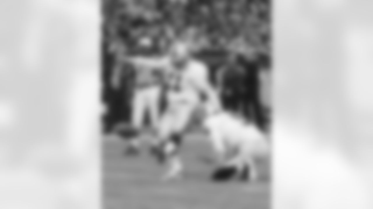 K Sebastian Janikowski kicks the PAT.