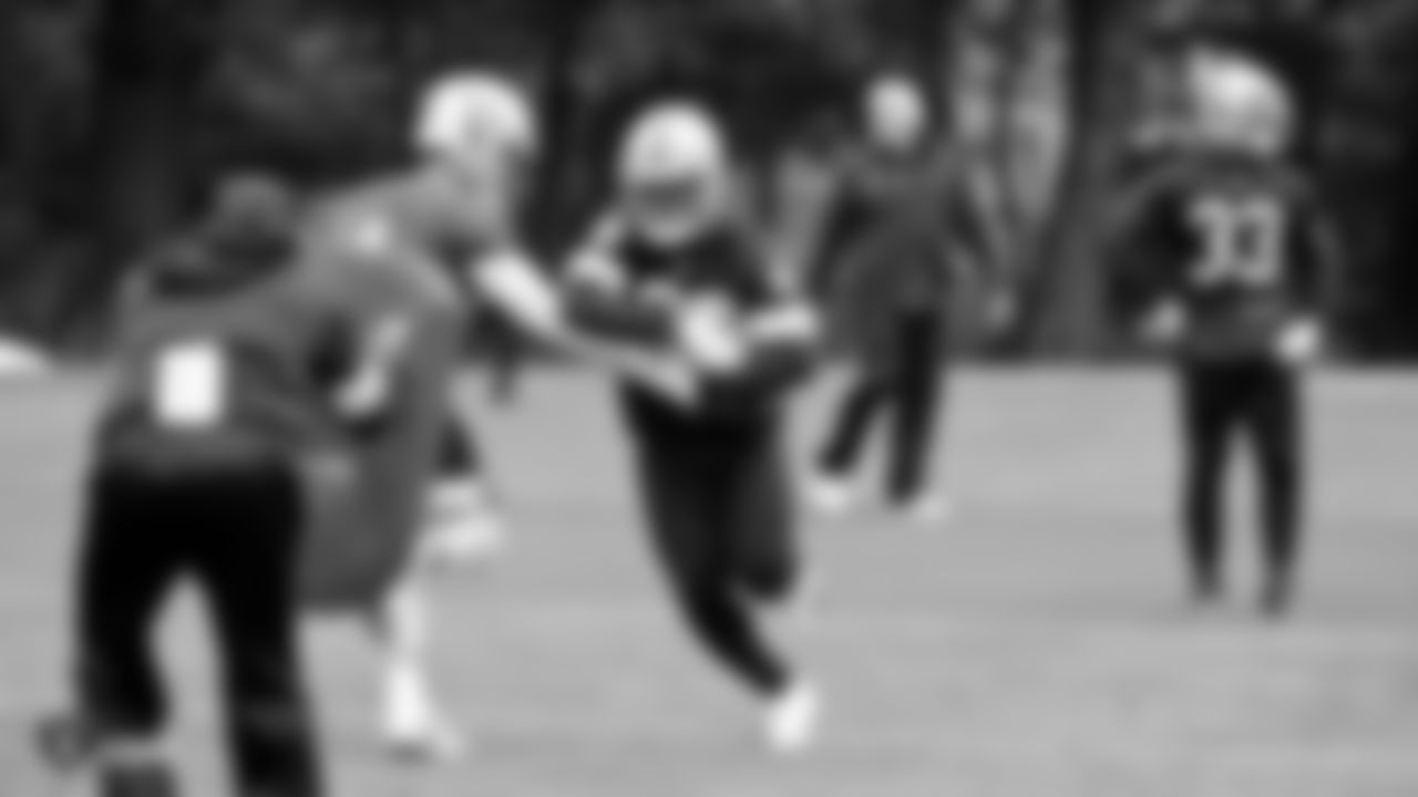 Raiders quarterback Derek Carr (4) and running back Josh Jacobs (28) on the field for practice at The Grove Hotel.