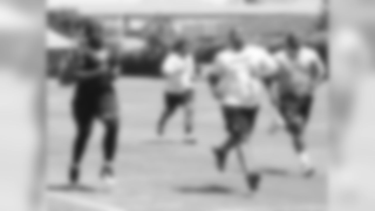 Raiders players running