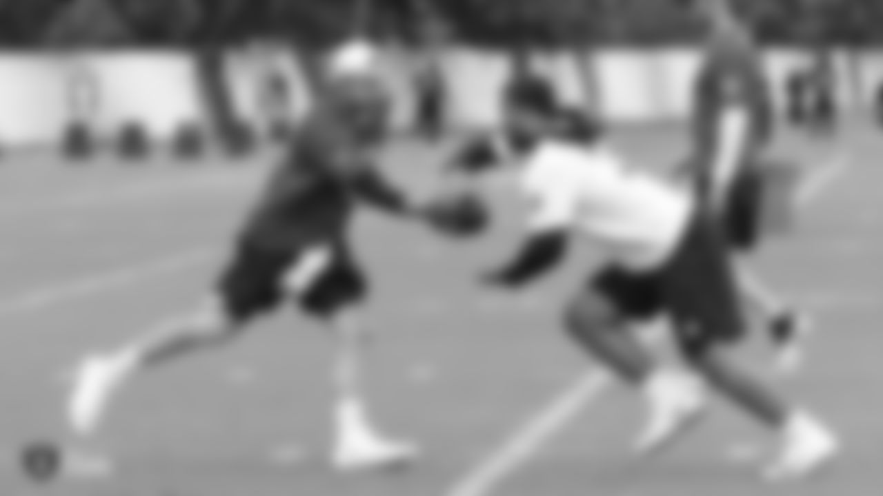 Raiders quarterback Landry Jones (2) and running back Chris Warren III (34) at a workout during phase two of the offseason program at the Raiders Practice Facility in Alameda, Calif.