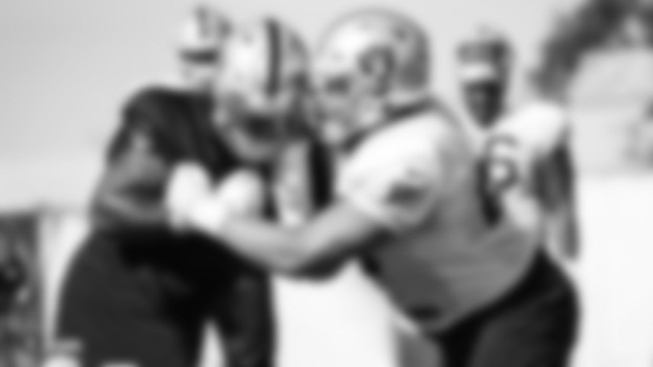 Raiders offensive lineman Andre James (68) blocks defensive tackle Maurice Hurst (73) during practice.