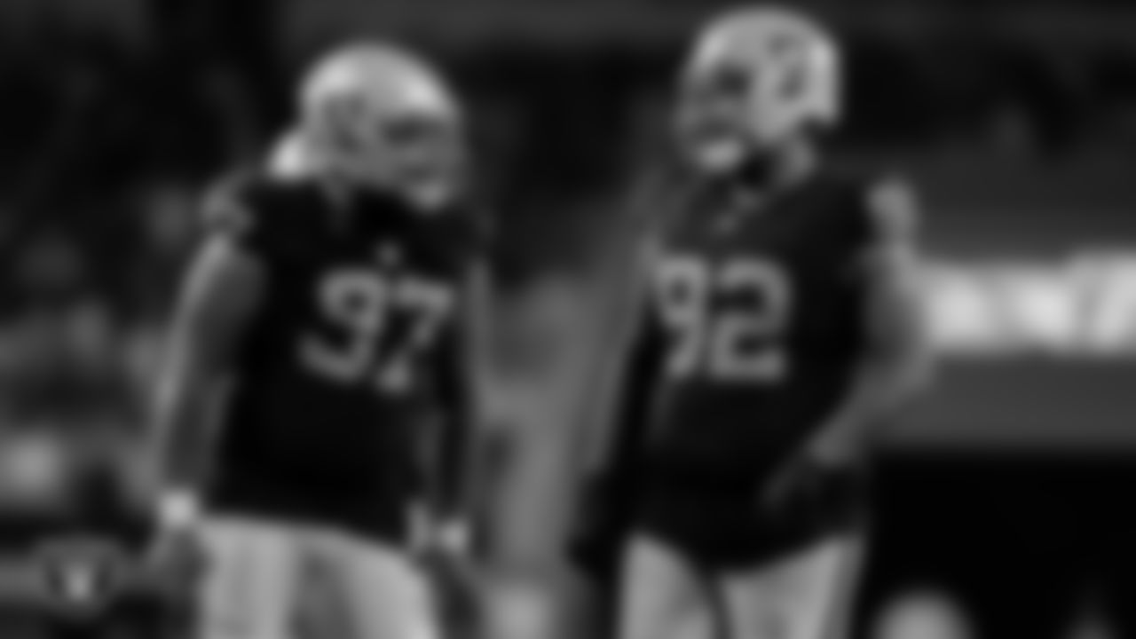 Las Vegas Raiders defensive tackle Nesta Jade Silvera (97) and defensive lineman Neil Farrell Jr. (92) during the preseason away game against the Dallas Cowboys at AT&T Stadium.