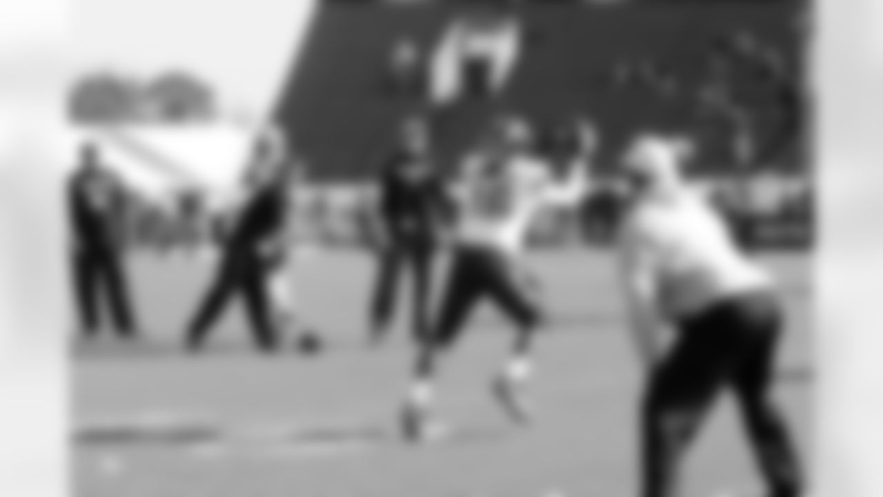Michigan WR Denard Robinson makes the catch up the middle.