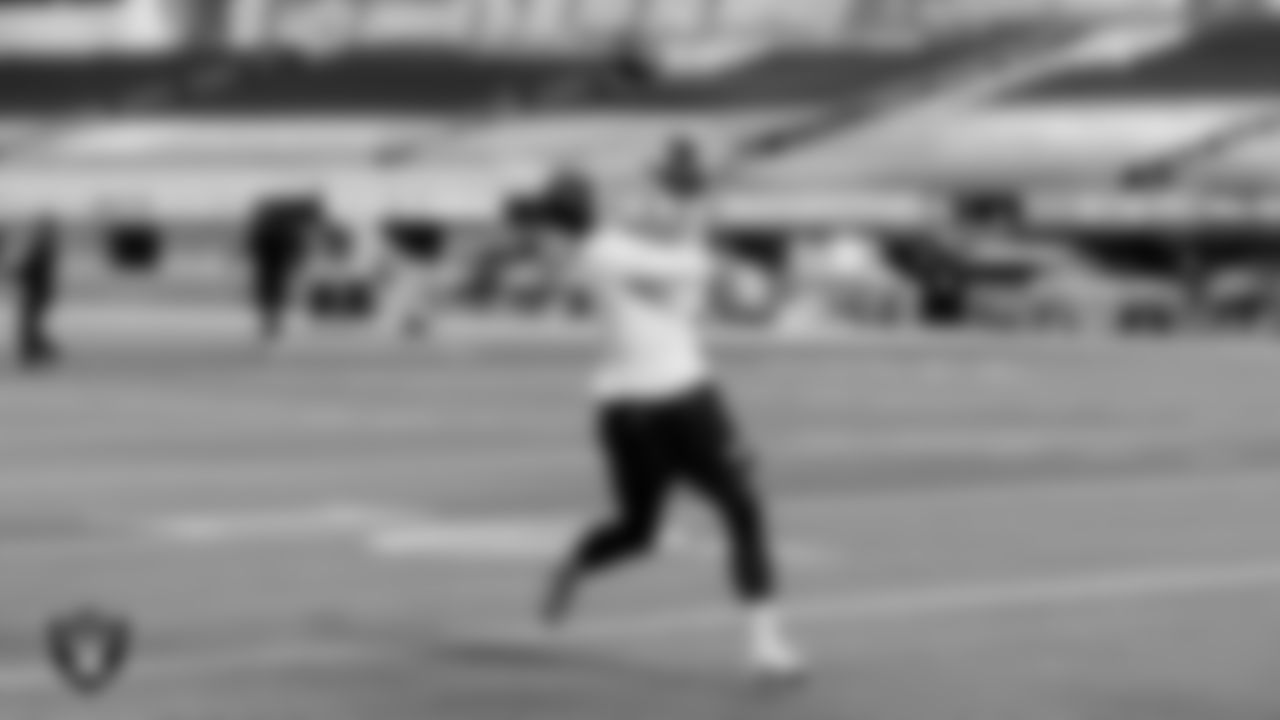 The Raiders warm up before the regular season game against the Los Angeles Chargers at SoFi Stadium.