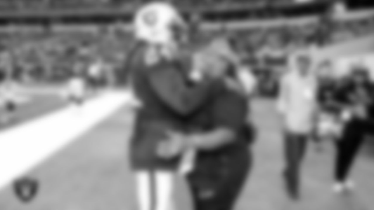 Las Vegas Raiders alumnus Marshawn Lynch with his mother.