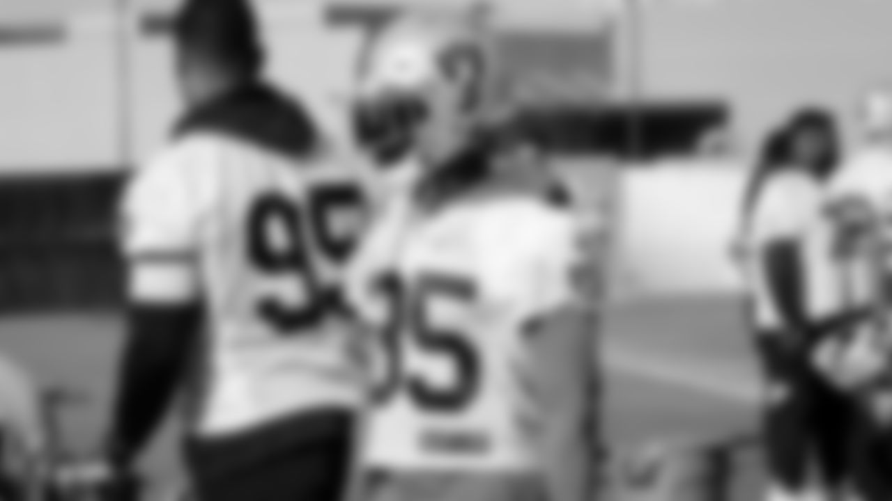 Raiders safety Curtis Riley (35) stands on the field during practice.