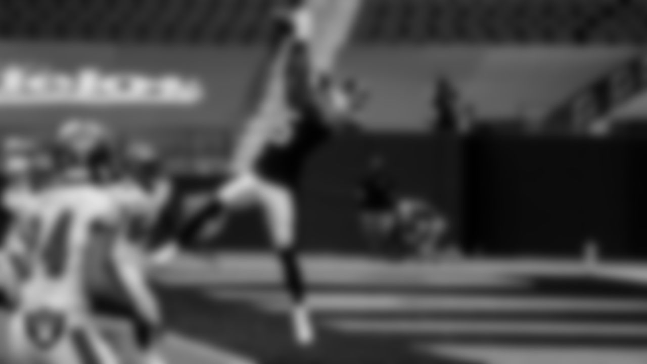Las Vegas Raiders wide receiver Nelson Agholor (15) makes a 20-yard touchdown catch during the regular season game against the Tampa Bay Buccaneers at Allegiant Stadium.