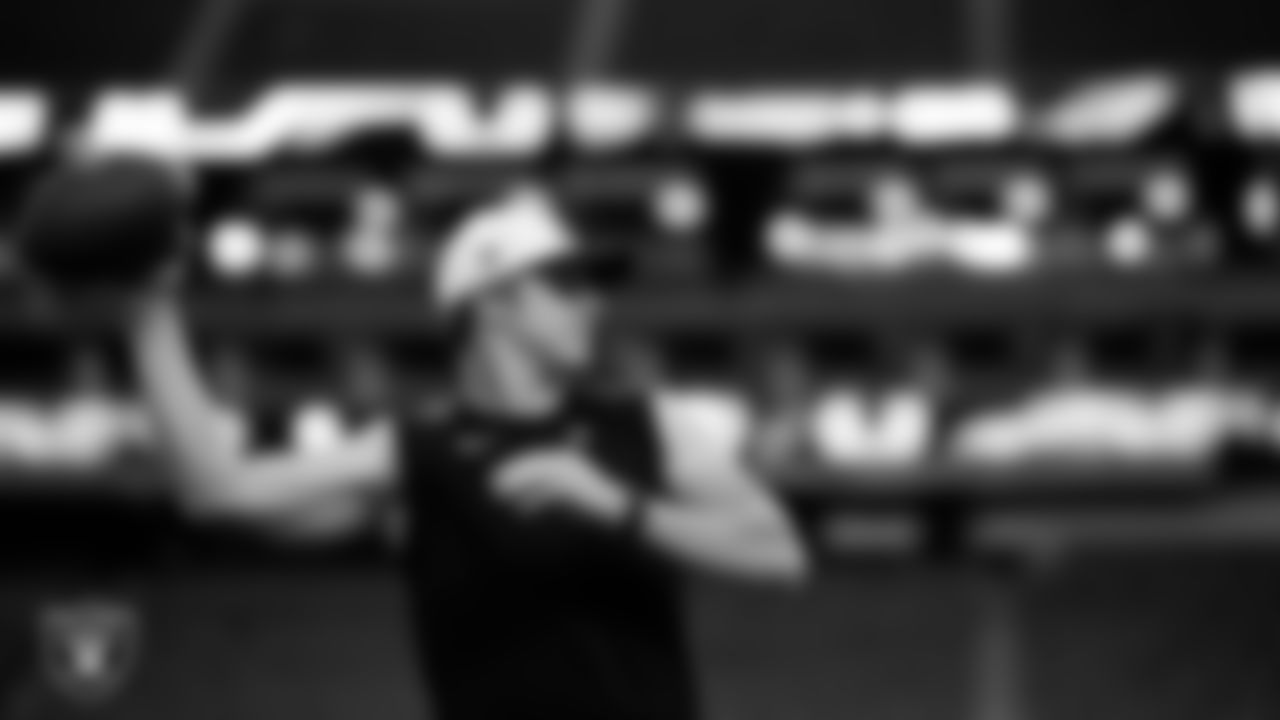 Las Vegas Raiders quarterback Chase Garbers (15) warming up before the regular season home game against the Indianapolis Colts at Allegiant Stadium.