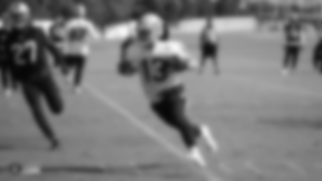 Raiders wide receiver Hunter Renfrow (13) runs after making a catch during practice at the Raiders Practice Facility.