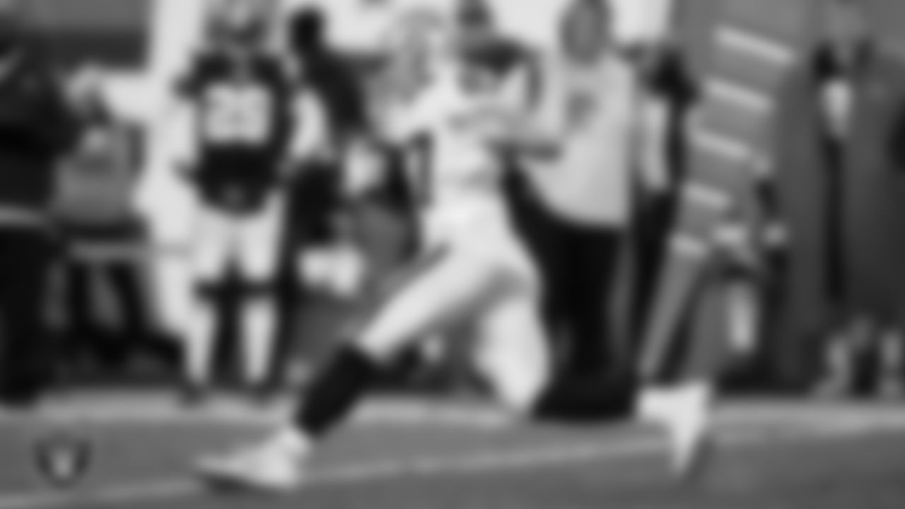 Las Vegas Raiders tight end Foster Moreau (87) runs after making a catch during the regular season away game against the Cleveland Browns.