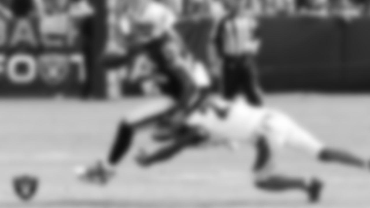 Oakland Raiders wide receiver Michale Crabtree (15) runs after making a catch during the regular season home game against the Cincinnati Bengals at O.Co Coliseum, Sunday, September 13, 2015, in Oakland, Calif.