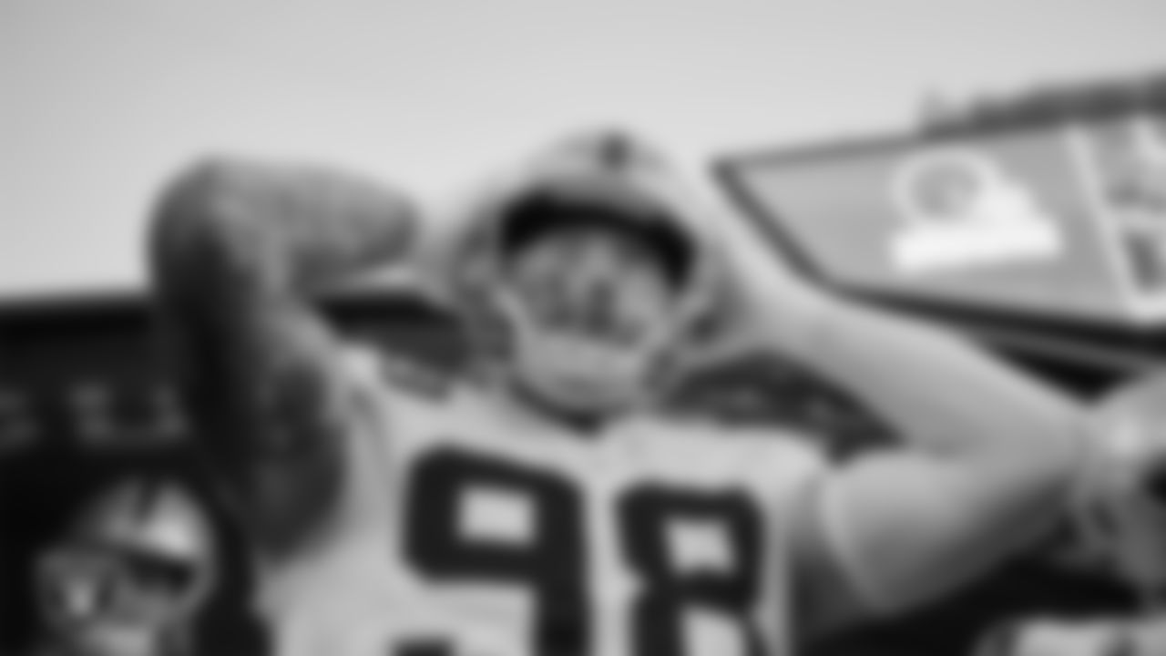 Las Vegas Raiders defensive end Maxx Crosby (98) waits to be introduced onto the field before the regular season away game against the Cleveland Browns.