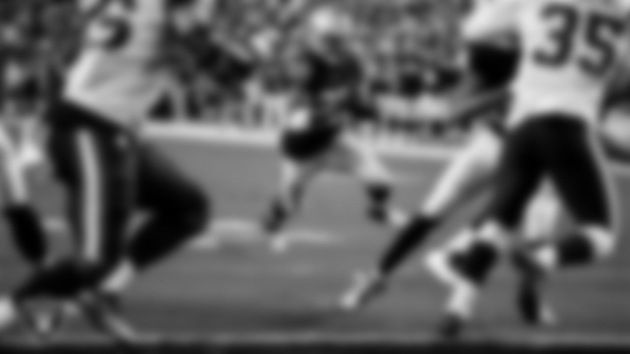 Las Vegas Raiders running back Brittain Brown (38) rushes for a 3-yard touchdown during the preseason home game against the New England Patriots at Allegiant Stadium.