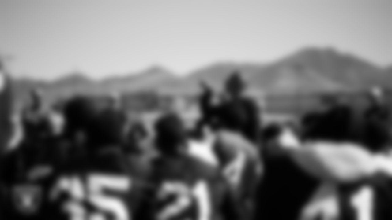 Las Vegas Raiders Interim Head Coach/special teams coordinator Rich Bisaccia in a huddle during practice at Intermountain Healthcare Performance Center.