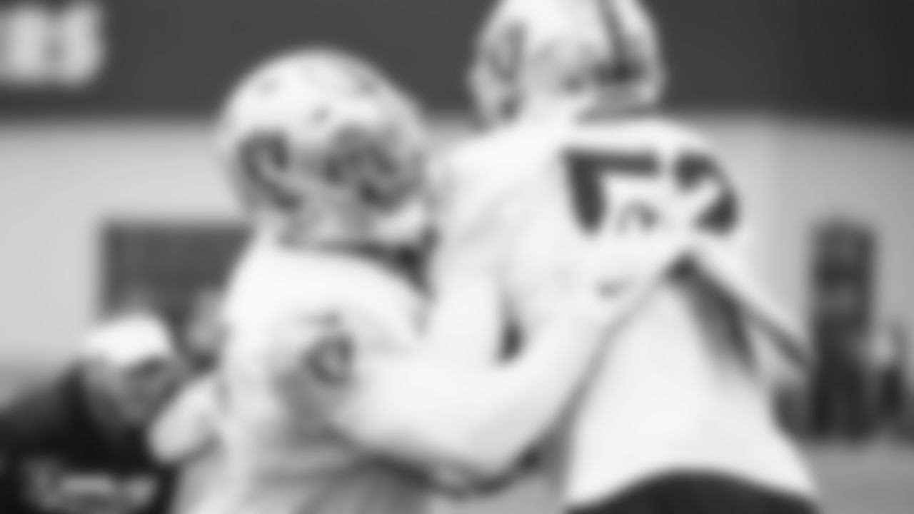 Raiders linebacker Will Compton (51) and linebacker Marquel Lee (52) go through defensive drills.