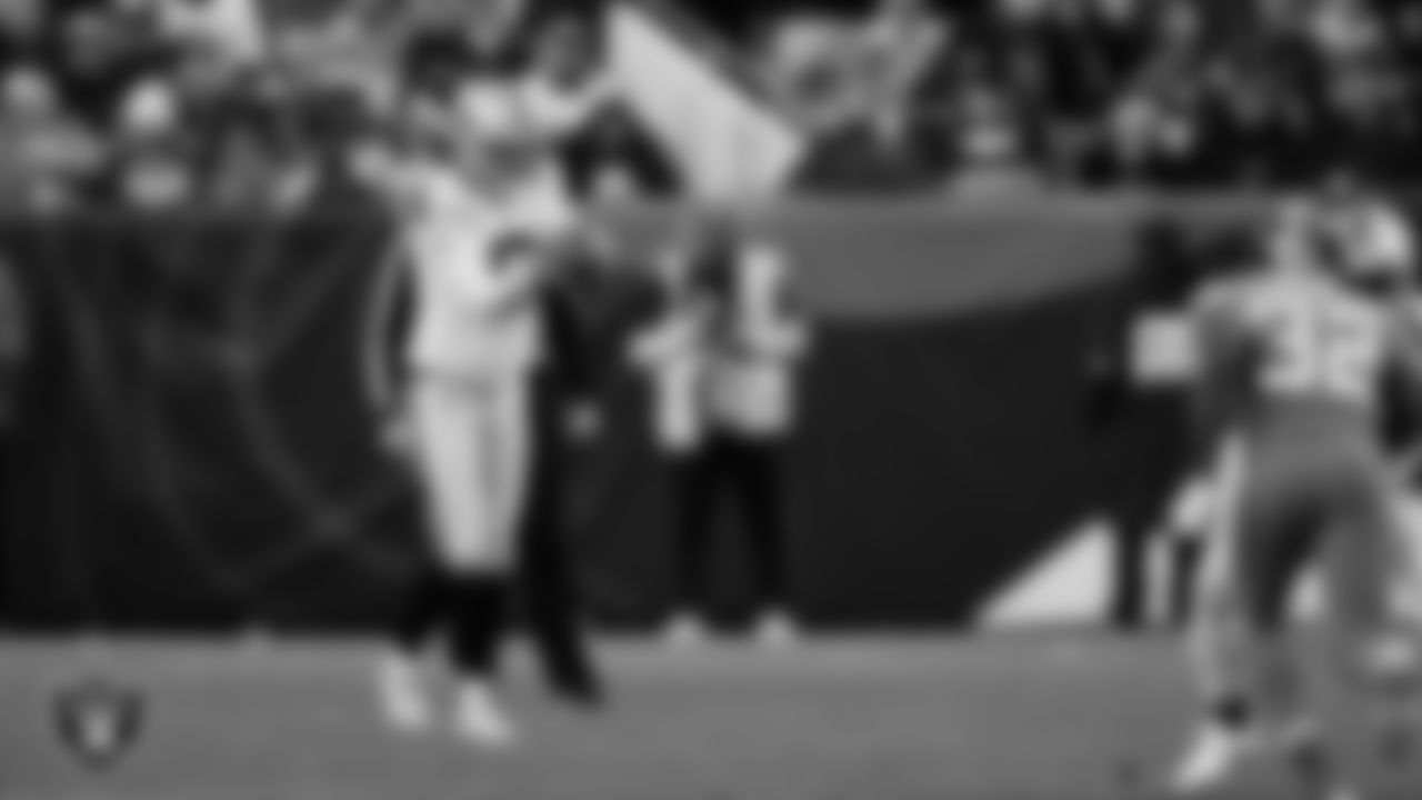 Las Vegas Raiders punter AJ Cole (6) punts during the regular season away game against the Denver Broncos at Empower Field at Mile High.