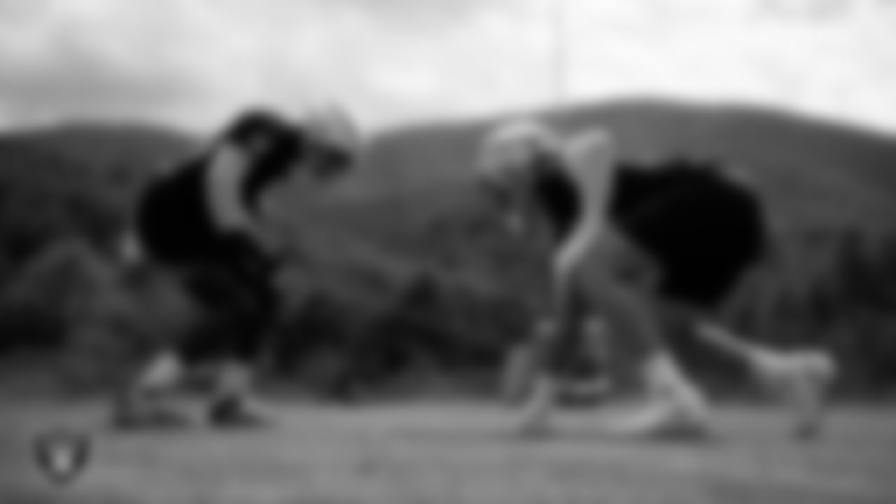 Las Vegas Raiders defensive end Janarius Robinson (97) and defensive end Maxx Crosby (98) during practice at The Greenbrier Sports Performance Center.