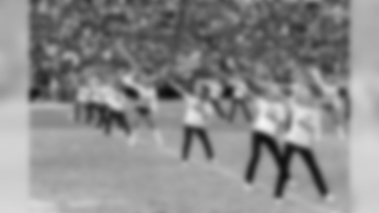 Dance studios perform with the Raiderettes at halftime.