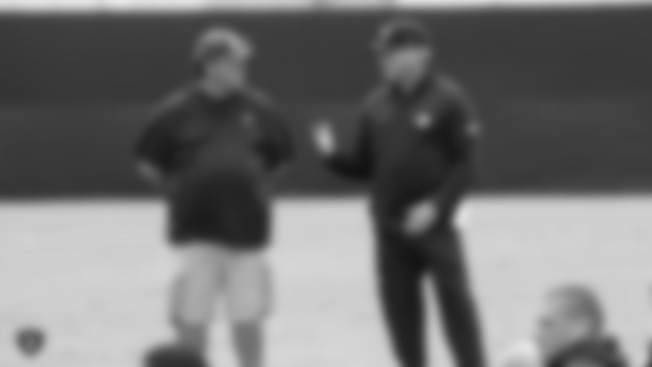 Raiders defensive coordinator Paul Guenther and Head Coach Jon Gruden on the field for practice.