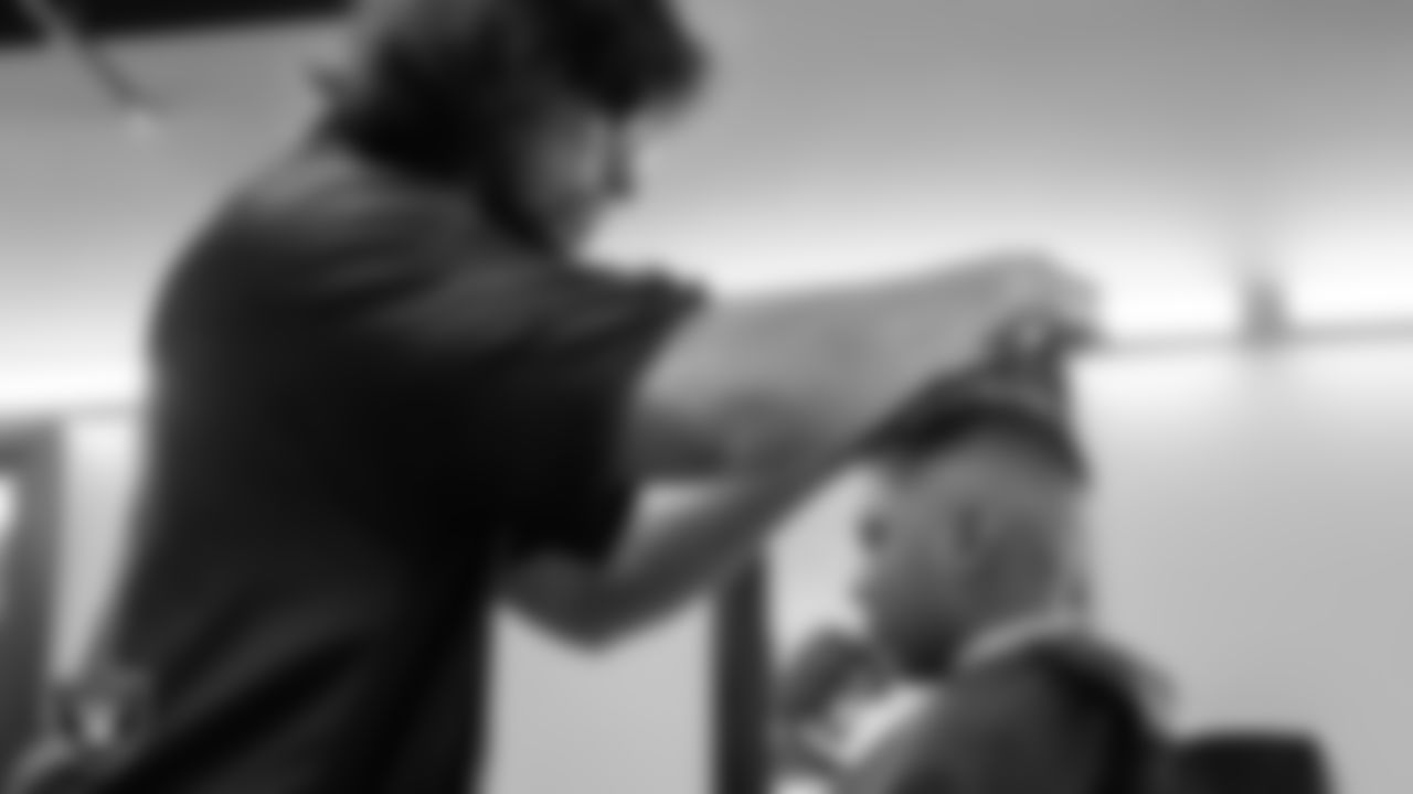 Students receive free haircuts and beautician services for the back to school season courtesy of the Las Vegas Raiders at Expertise Cosmetology Institute.