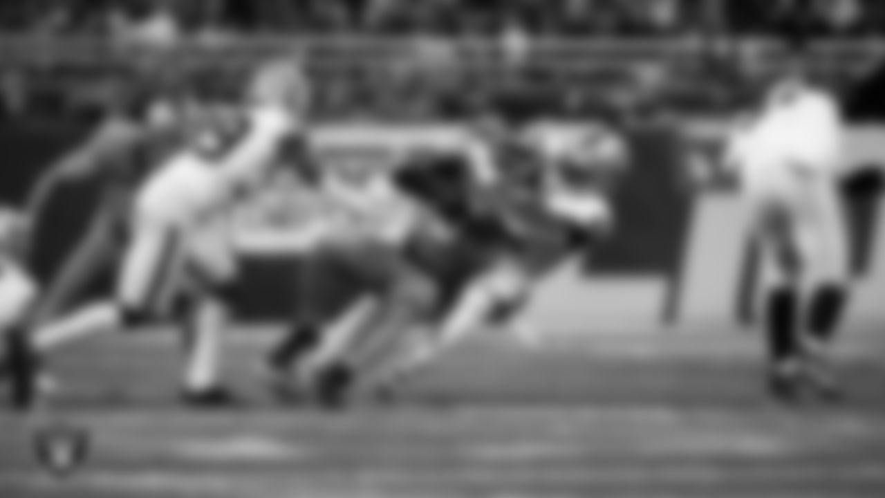 Las Vegas Raiders defensive end Malcolm Koonce (51) makes a tackle during the regular season away game against the Detroit Lions at Ford Field.