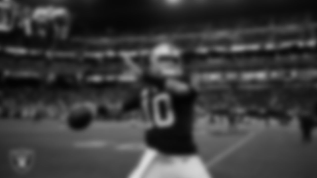 Las Vegas Raiders quarterback Jimmy Garoppolo (10) warming up before the regular season home game against the Green Bay Packers at Allegiant Stadium.