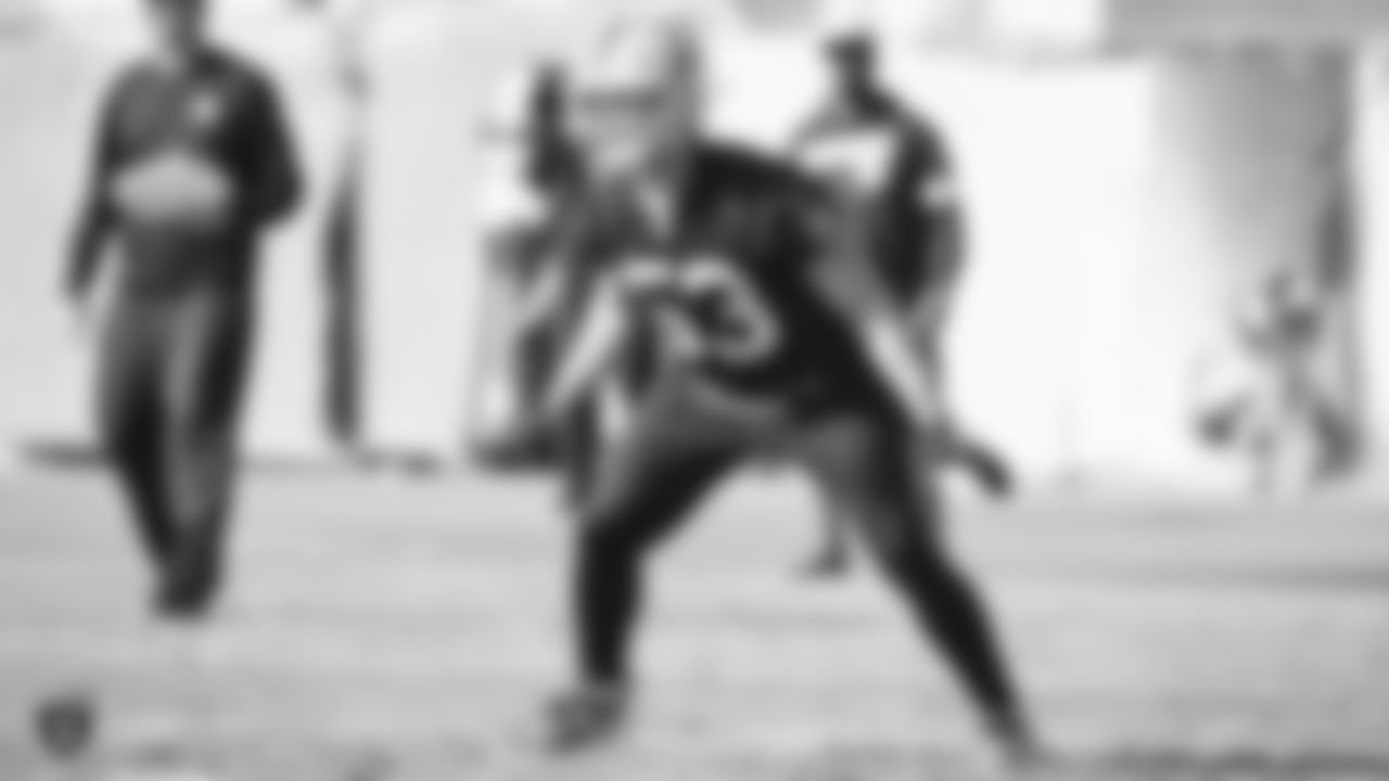 Raiders linebacker Quentin Poling (53) defends during practice.