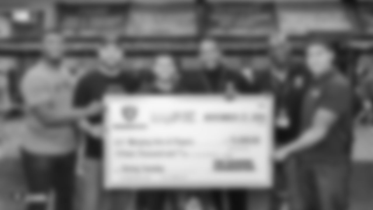 The Raiders Foundation surprises Merging Vets and Players with a donation check of $15,000 each, Tuesday, November 27, 2018, in Las Vegas, Nevada.