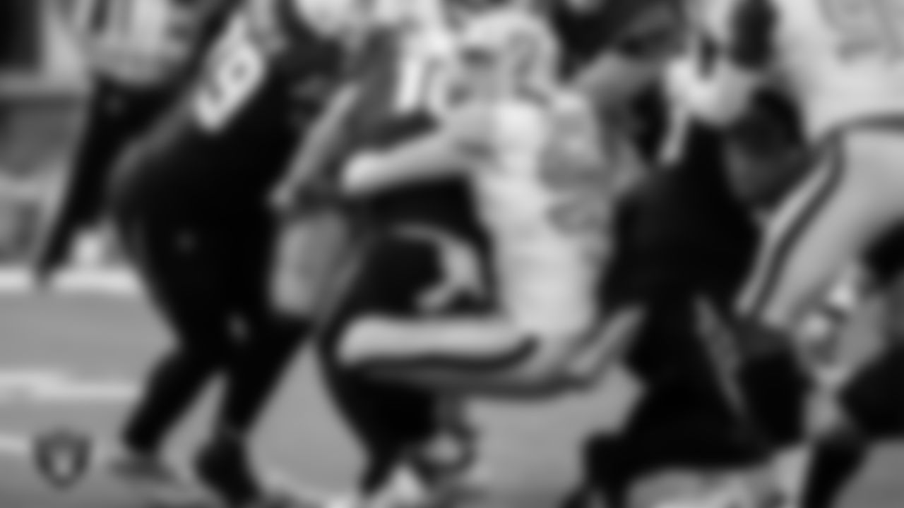 Las Vegas Raiders defensive end Maxx Crosby (98) sacks the quarterback during the regular season away game against the Los Angeles Chargers.