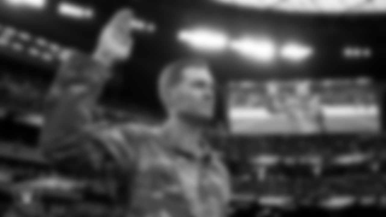 Members of the United States Air Force take part in a reenlistment ceremony before the Las Vegas Raiders' regular season home game against the Cincinnati Bengals.