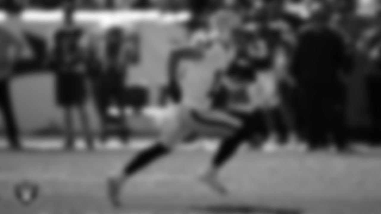 Las Vegas Raiders wide receiver Hunter Renfrow (13) runs after making a catch during the regular season away game against the Denver Broncos.