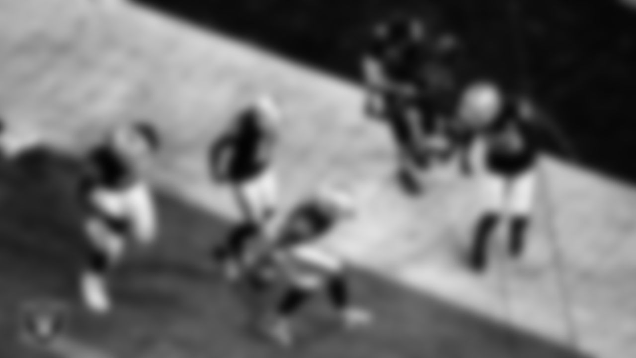 Las Vegas Raiders running back Jalen Richard (30) celebrates after rushing for a 20-yard touchdown during the regular season home game against the New Orleans Saints.
