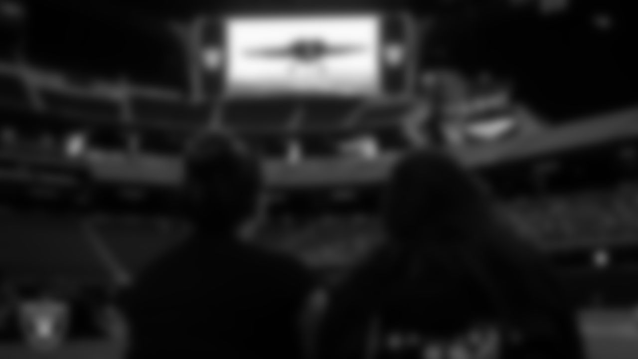Season ticket members during a screening of Top Gun: Maverick at Allegiant Stadium.