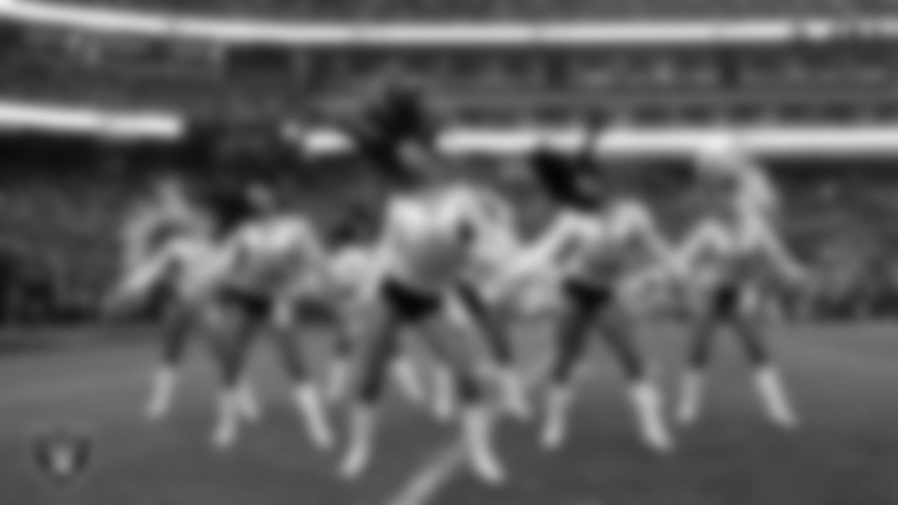 The Raiderettes line 4 performs on the field during the regular season home game against the Kansas City Chiefs at Allegiant Stadium.