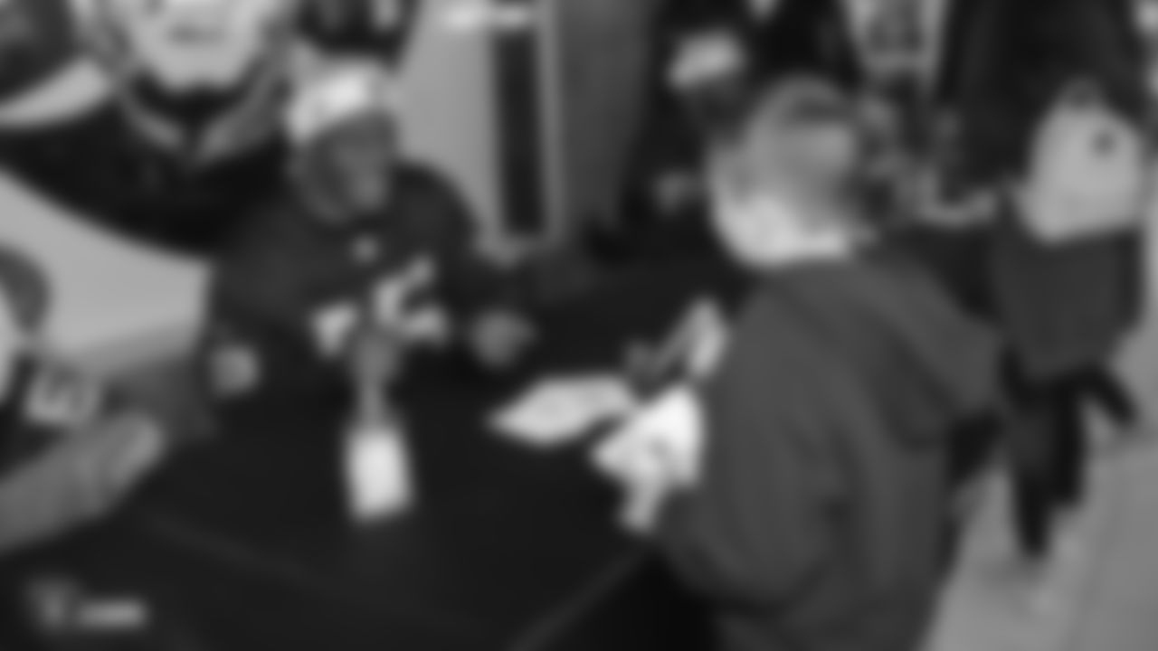 The Raiders Foundation hosts a Toys for Tots drive where guests have the chance to meet Oakland Raiders linebacker Jason Cabinda (53), linebacker Marquel Lee (55), and defensive tackle Maurice Hurst (73) in exchange for a toy or $20 donation to the charity, Tuesday, December 4, 2018, in Hayward, California.