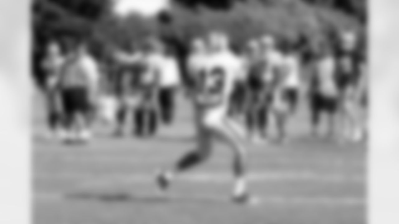 WR Steve Goulet turns for the catch.