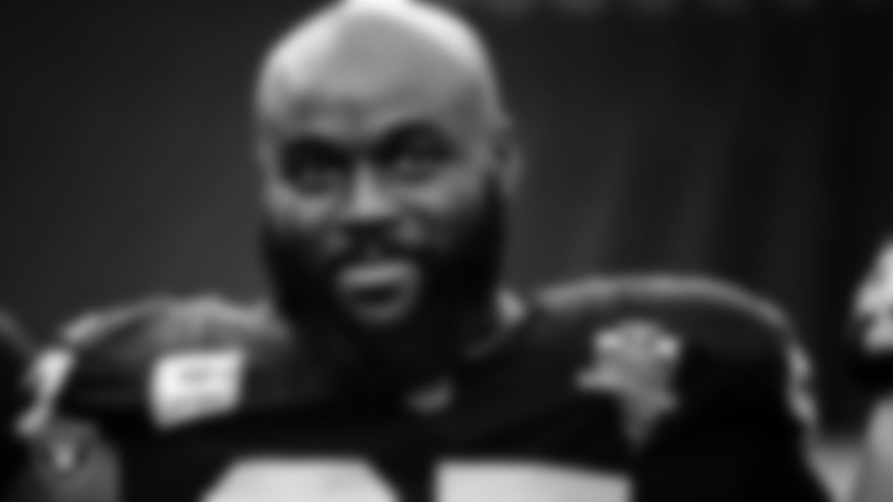 Las Vegas Raiders defensive tackle Maliek Collins (97) during the national anthem before the regular season home game against the Tampa Bay Buccaneers.