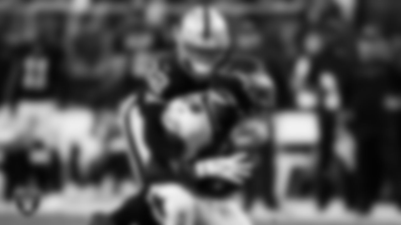 Las Vegas Raiders safety Dallin Leavitt (32) makes a tackle during the regular season home game against the Philadelphia Eagles.