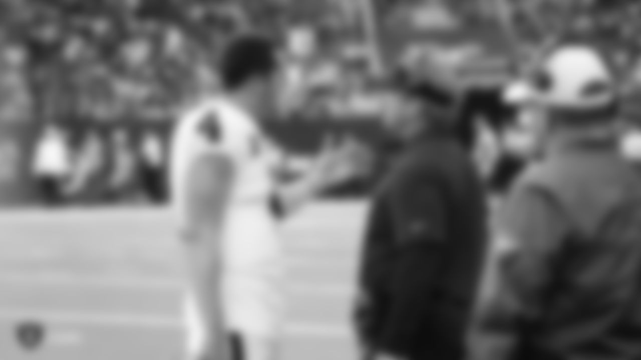 Raiders quarterback Derek Carr (4) and Head Coach Jon Gruden during the regular season game against the Houston Texans at NRG Stadium.