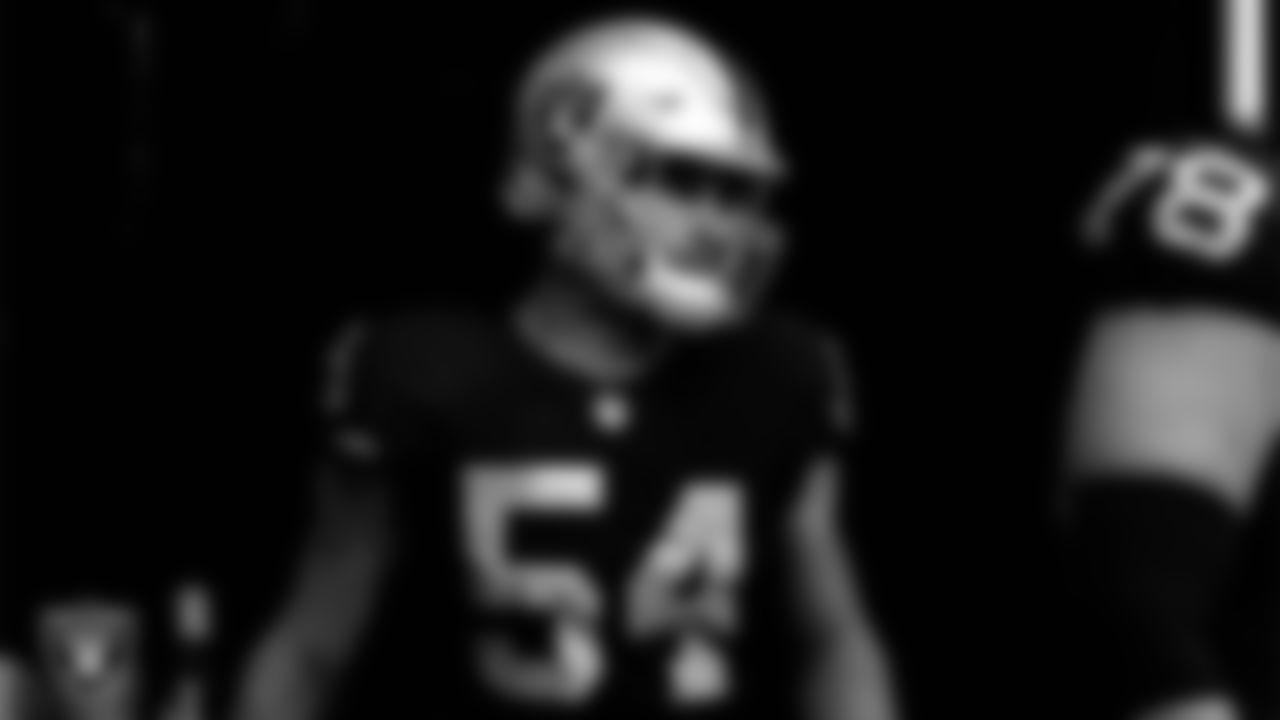 Las Vegas Raiders defensive end Zach VanValkenburg (54) returns to the field following the halftime break during the preseason home game against the Minnesota Vikings at Allegiant Stadium.